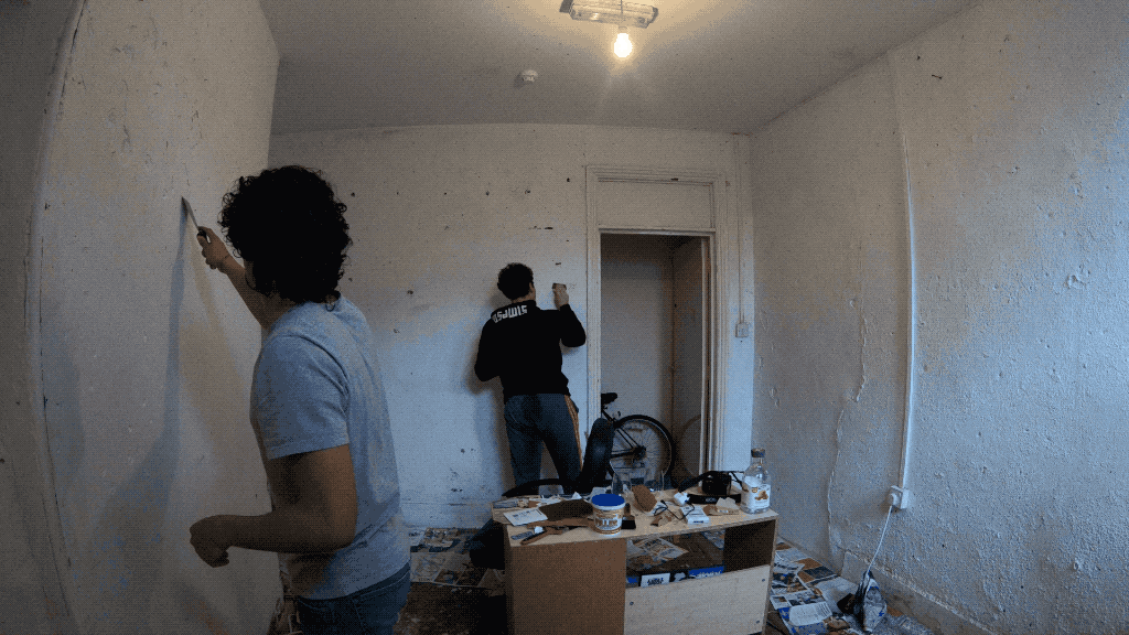 Plastering and painting the basement room